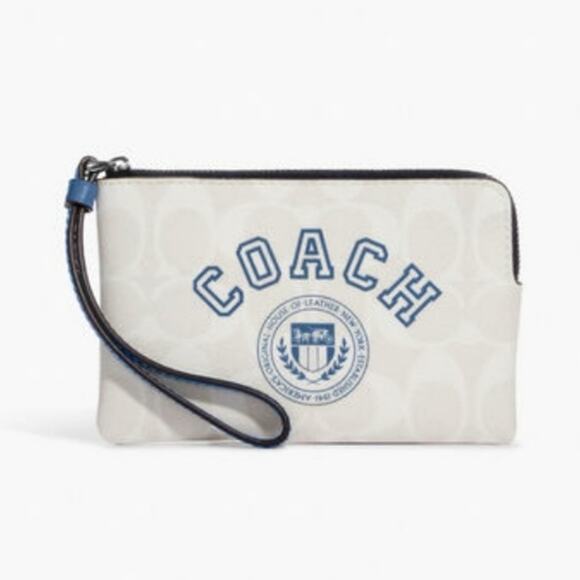 COACH VARSITY CORNER ZIP WRISTLET IN SIGNATURE CANVAS CHALK/INDIGO - Picture 1 of 3